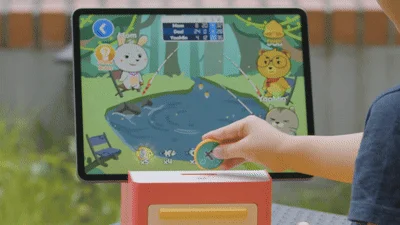 Child interacting with a tablet game