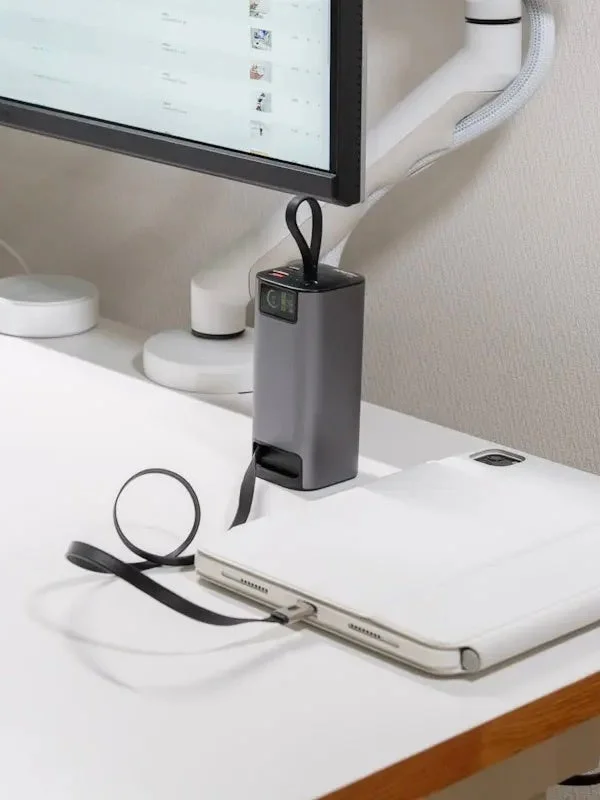 Portable charger charging a tablet