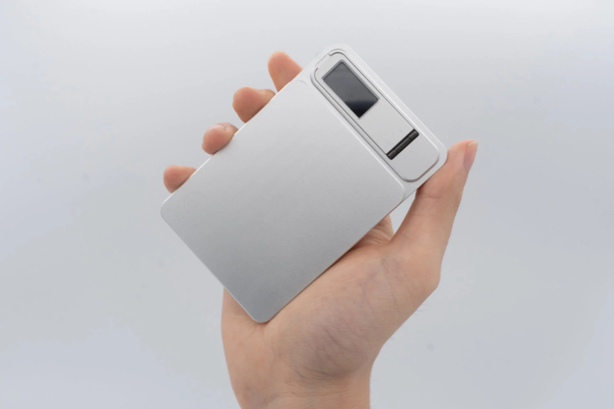 Hand holding Element Metal Power Bank 8000