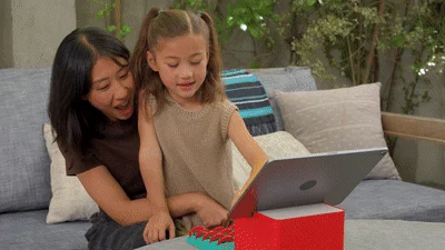 Child and adult learning with Rolling Seeds