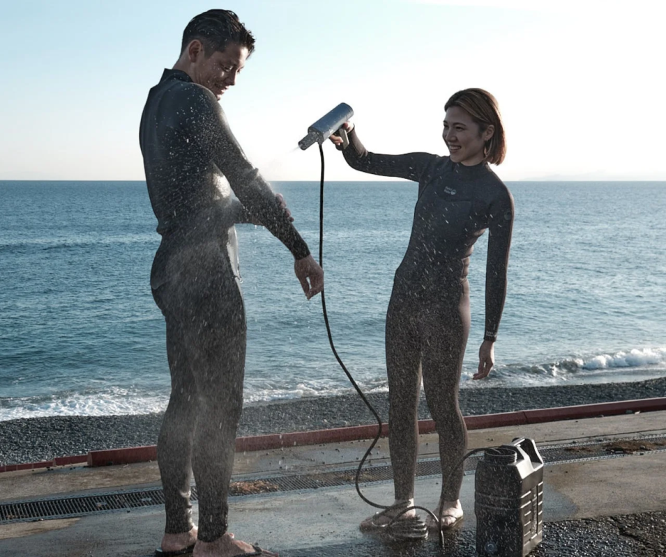 Couple showering after marine sports