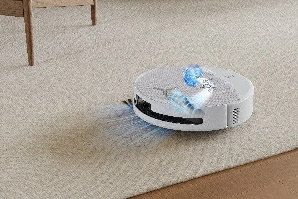 Robot vacuum cleaner cleaning a carpet