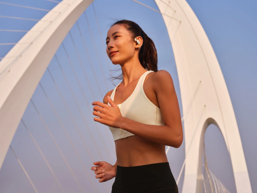 Woman jogging with earphones