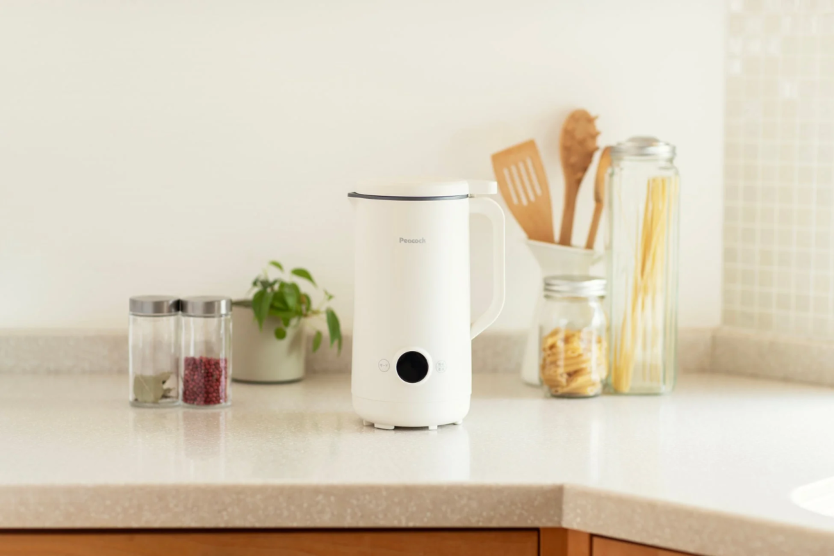 Clean kitchen counter with a white multi soup pot and other items
