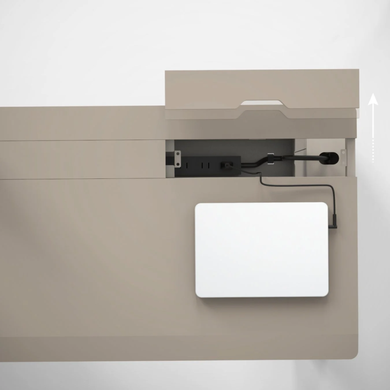 Cable management within a desk