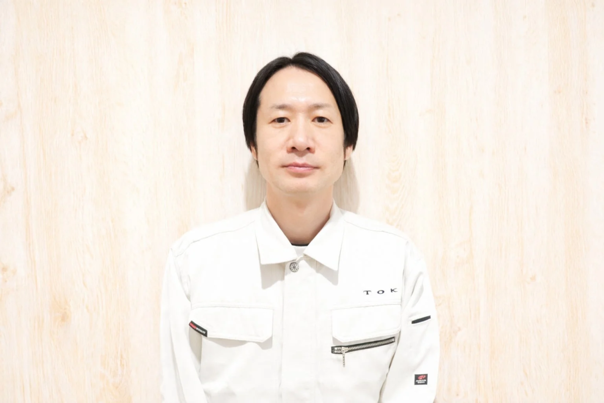 Man in white work uniform