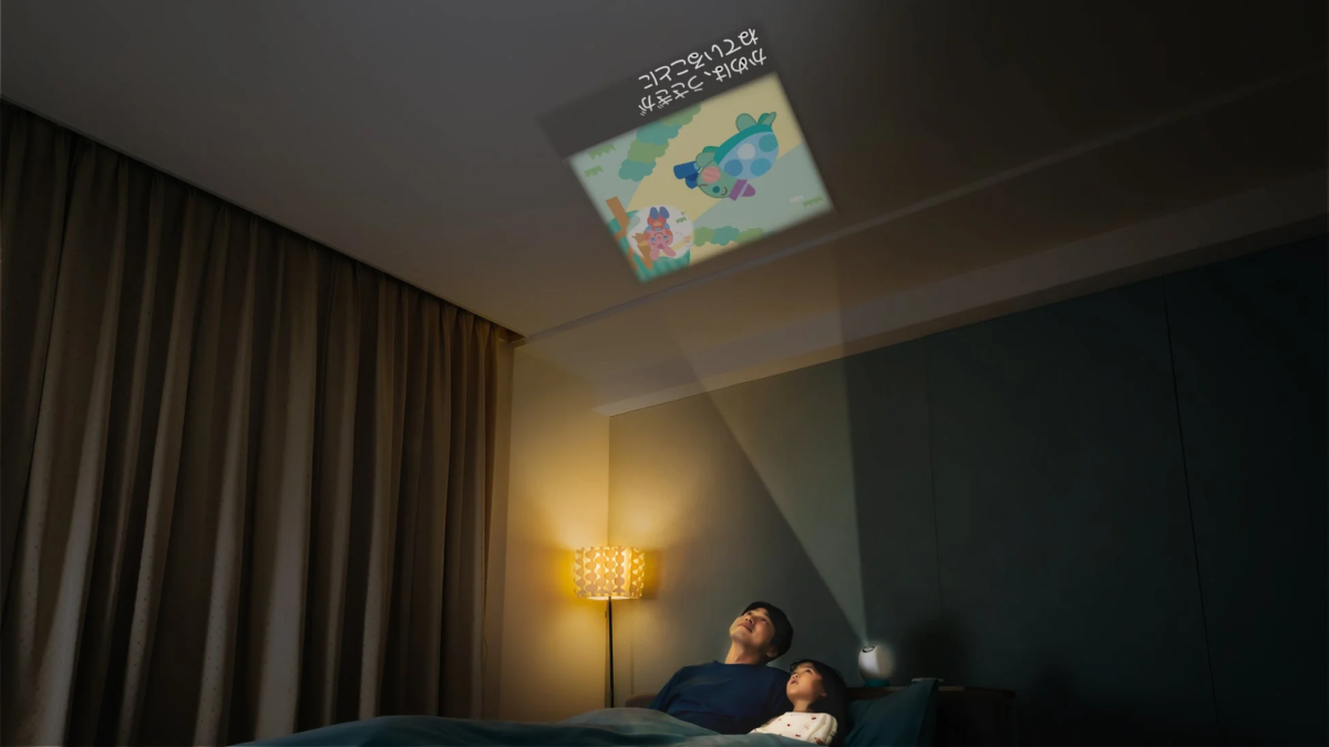 Parent and child watching projection