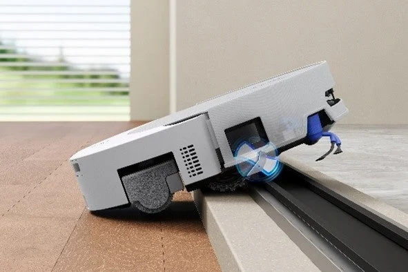 Robot vacuum cleaner climbing a step