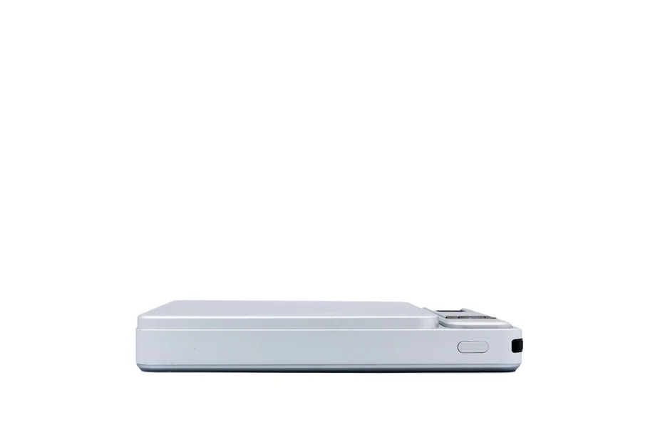 Thin white portable device side view