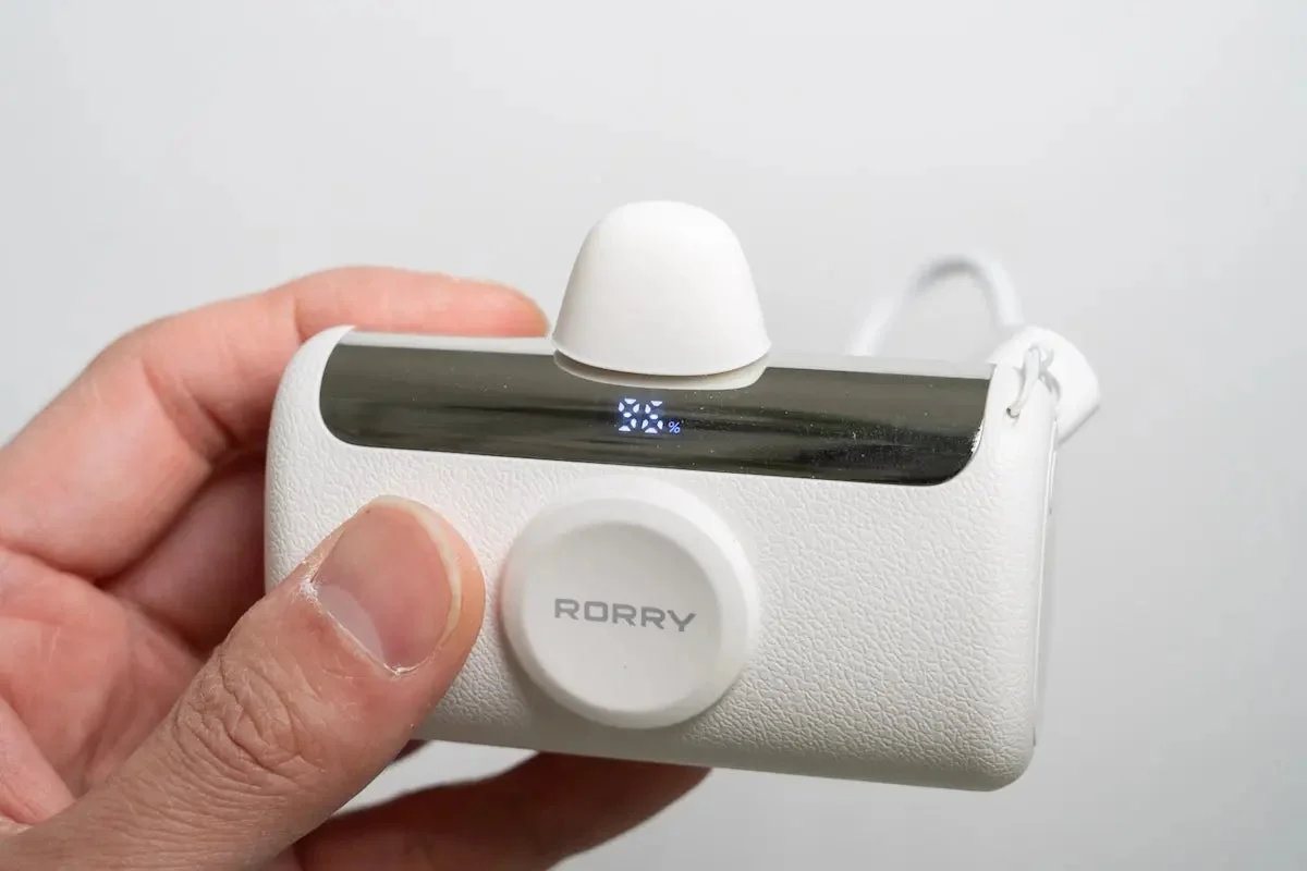 Side view with power button and ports