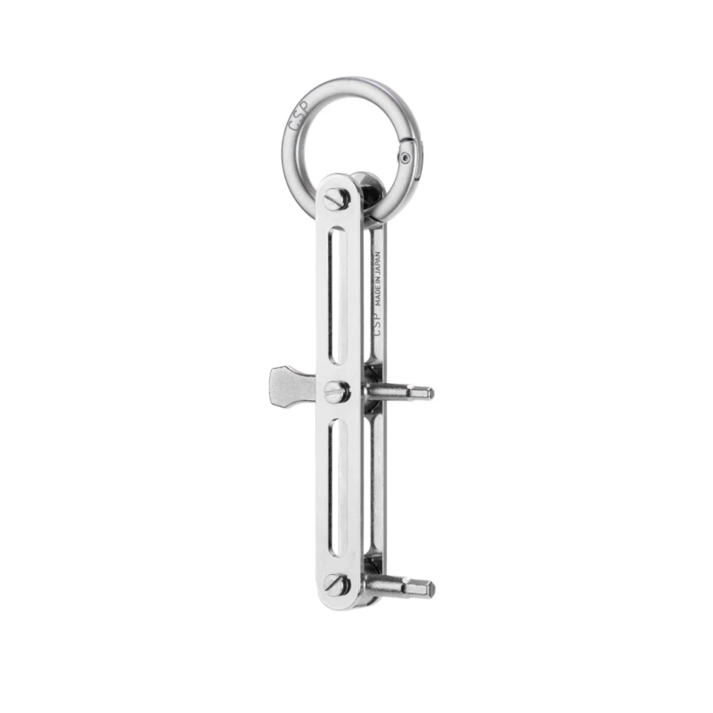 A silver metal keyholder with a carabiner ring and hex wrench bits, marked "MADE IN JAPAN".