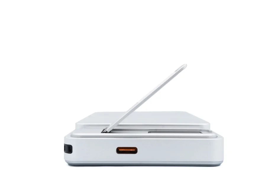 White electronic device with pop-up stand