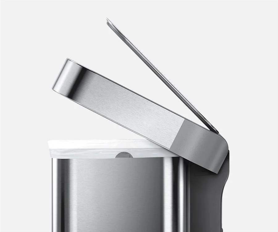 Stainless steel sensor can with trash bag installed and lid slightly open