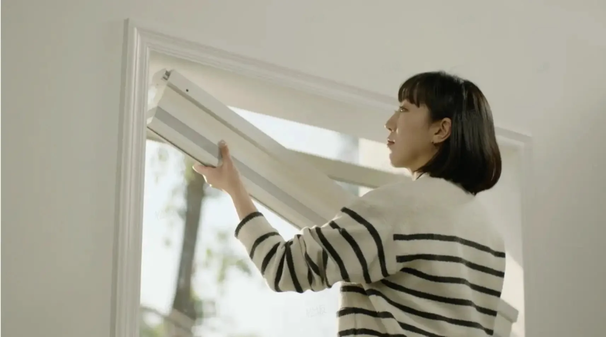 Woman Installing Shade