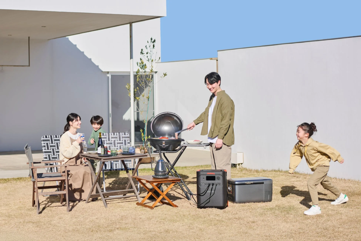 Family enjoying a BBQ with Jackery Portable Power Station 3600 Plus
