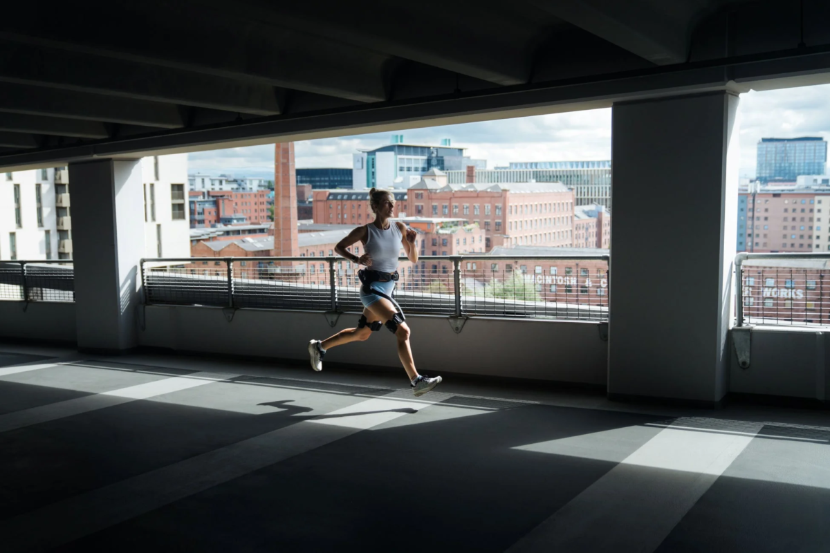 Woman running with Hypershell X Ultra