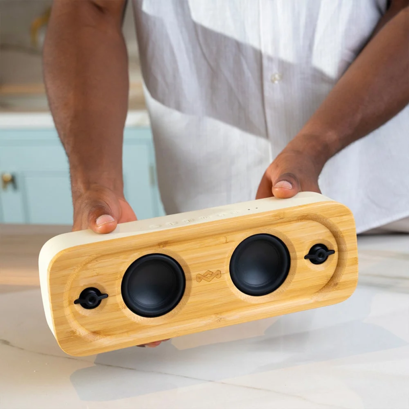 Man holding Get Together Go speaker