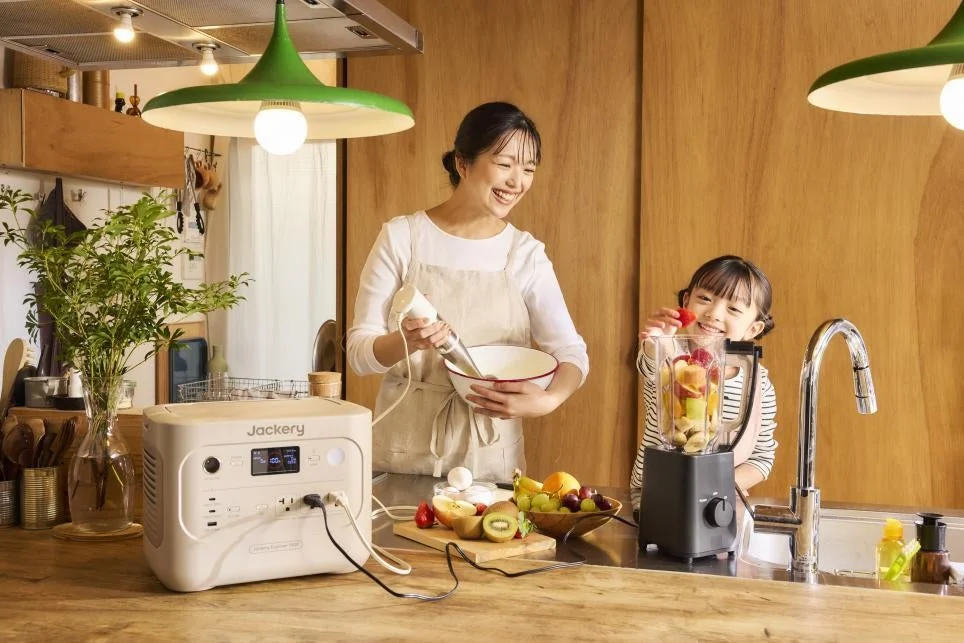 Mother and daughter cooking with Jackery Portable Power Station 1000 New