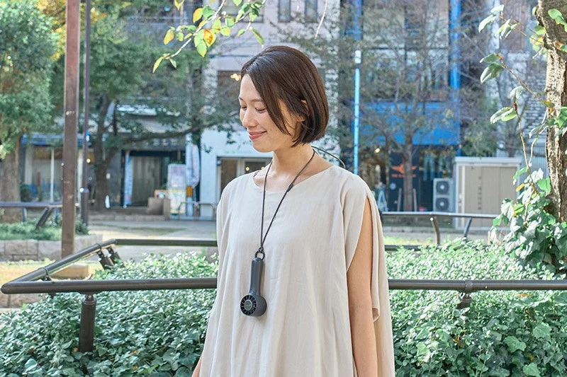 Woman with Neck Strap Fan