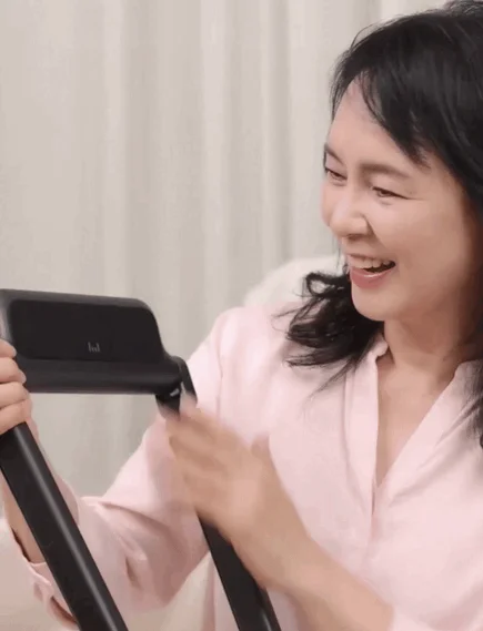 Woman operating a device