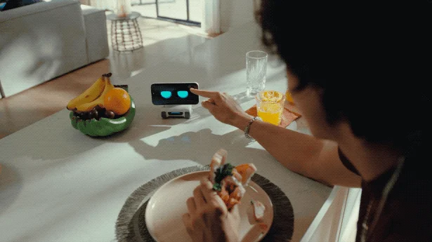 LOOI with a user at a dining table