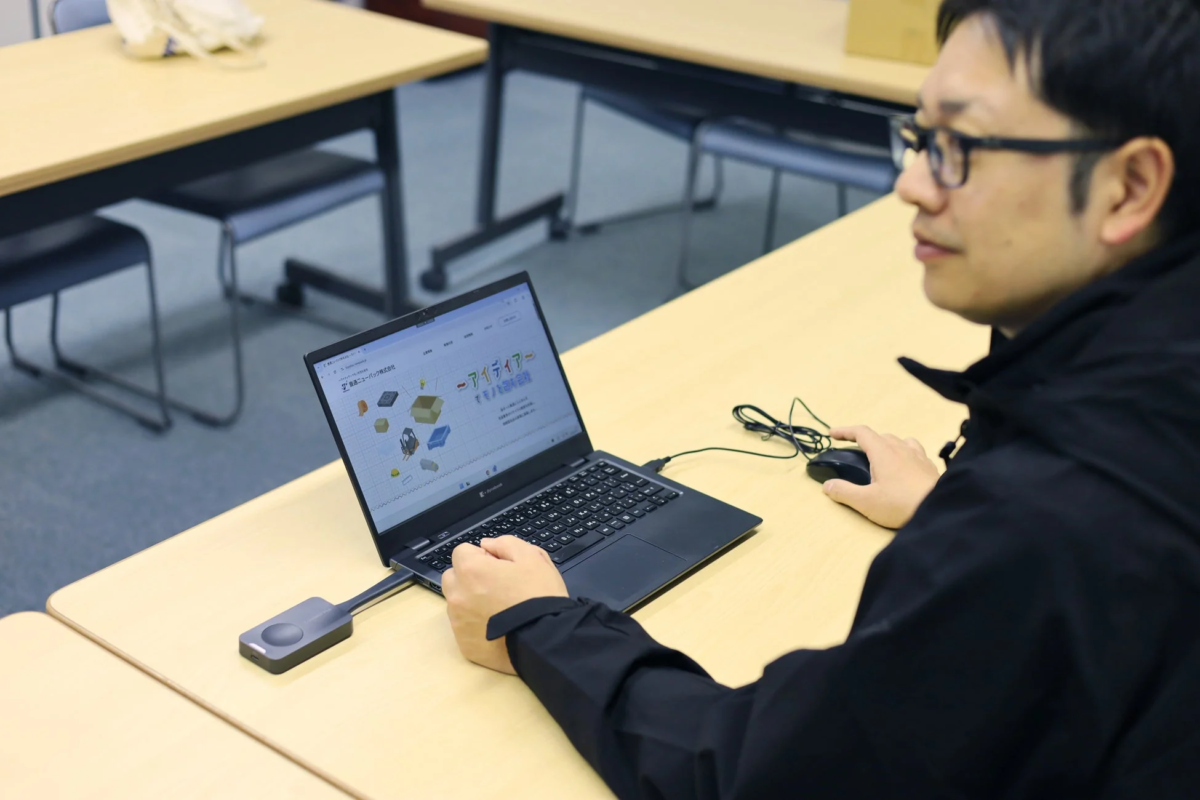 Man using laptop in office