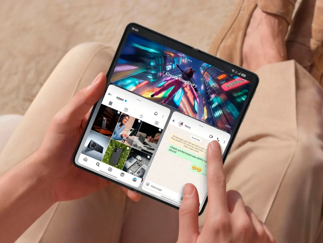 Person using a foldable smartphone with multiple apps open