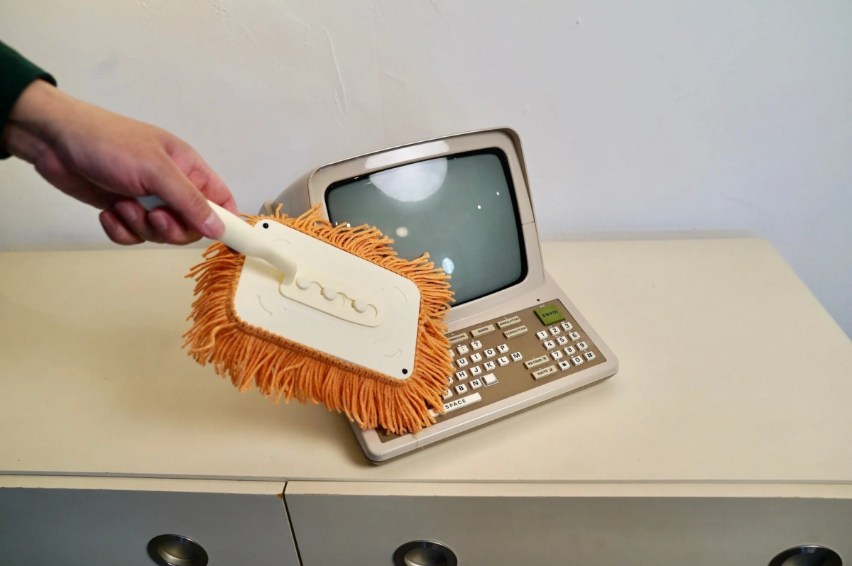 Mop cleaning a keyboard