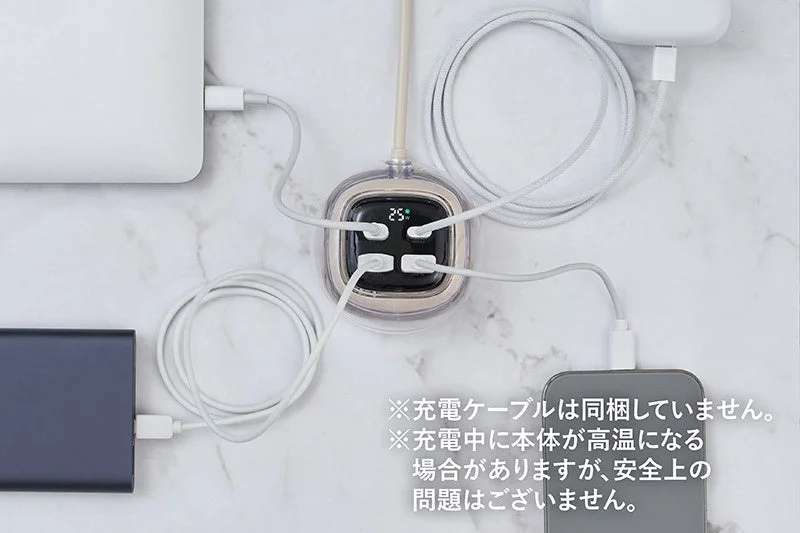 A multi-port USB charger with a laptop, smartphone, and mobile battery connected, illustrating simultaneous charging.