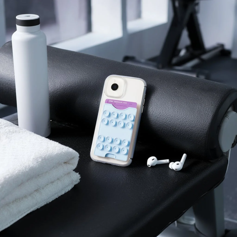 Smartphone with suction cup card case at the gym