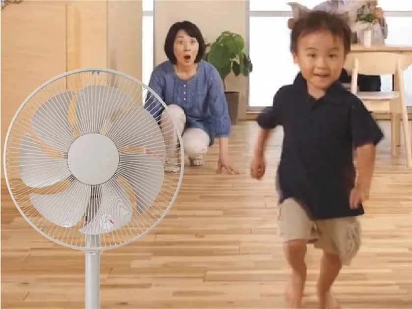 Child near fan