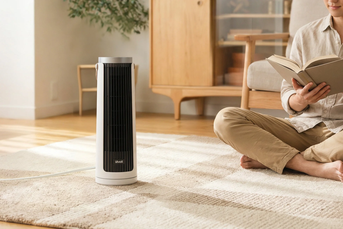 Man reading with fan