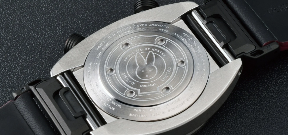 Case back with rabbit motif and serial number