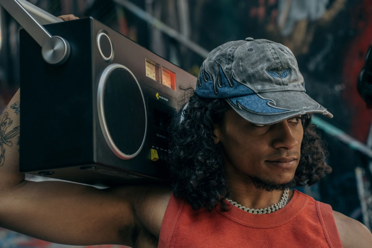 Person with boombox on shoulder