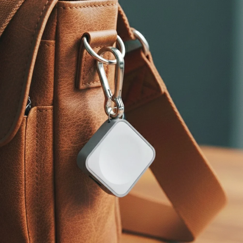 White portable charger on a bag