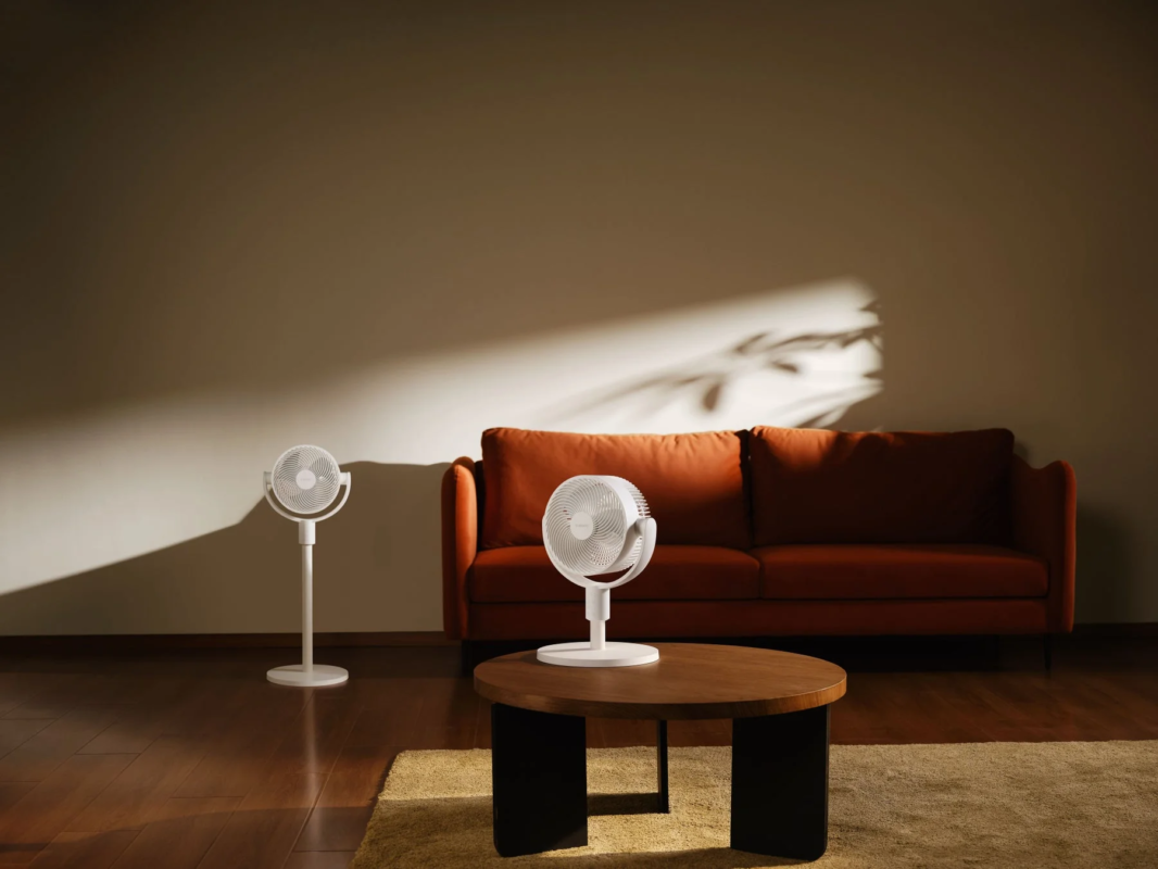 Two white fans in a living room