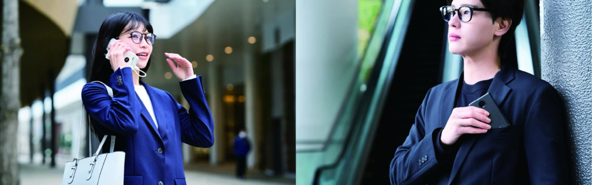 Business people using smartphones in urban setting