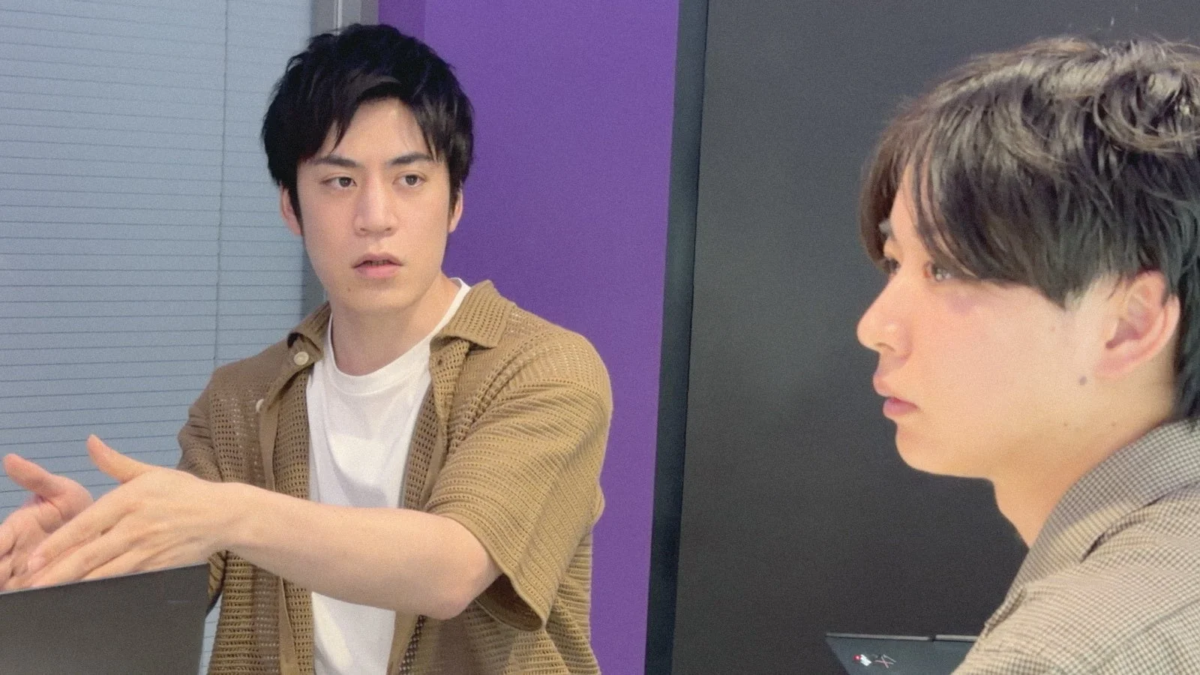 Two men discussing the project