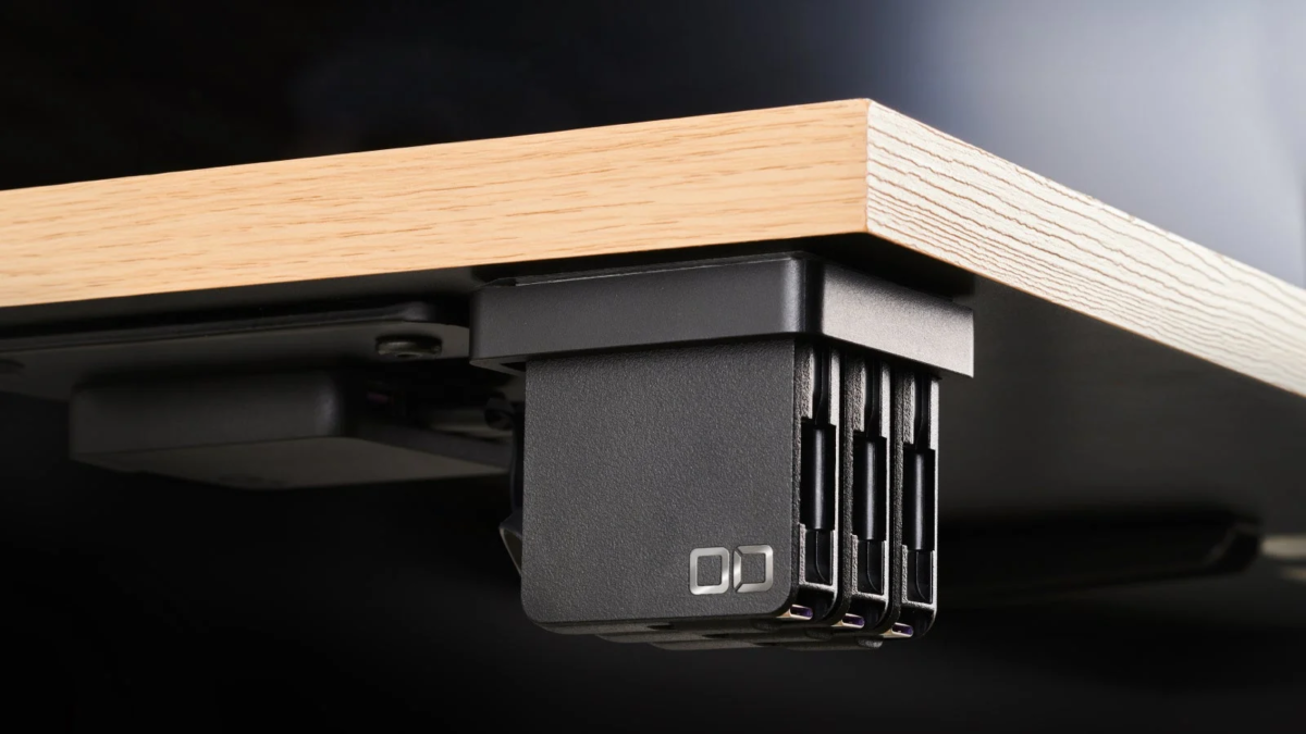 Close-up of Cerberus installed under a wooden desk
