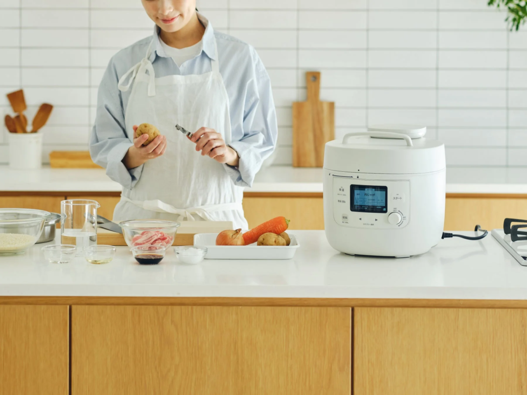 Woman Cooking with Ouchi Chef Cooker