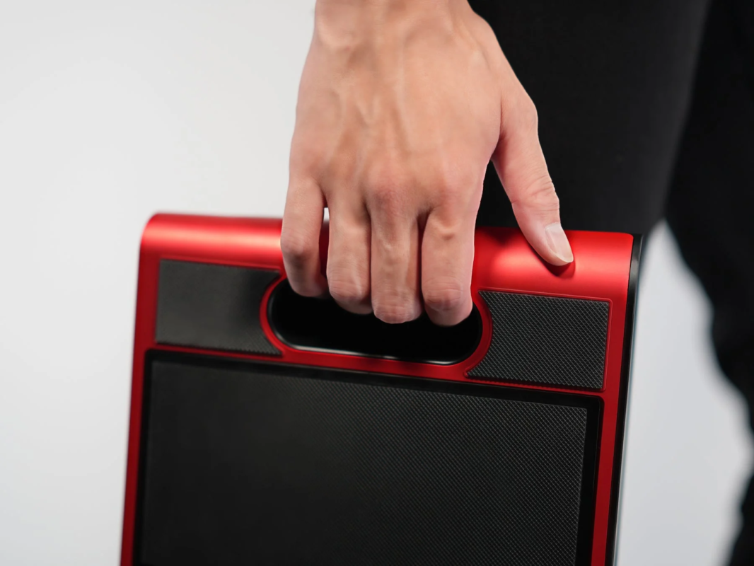 REJECT Arcade Controller held in hand