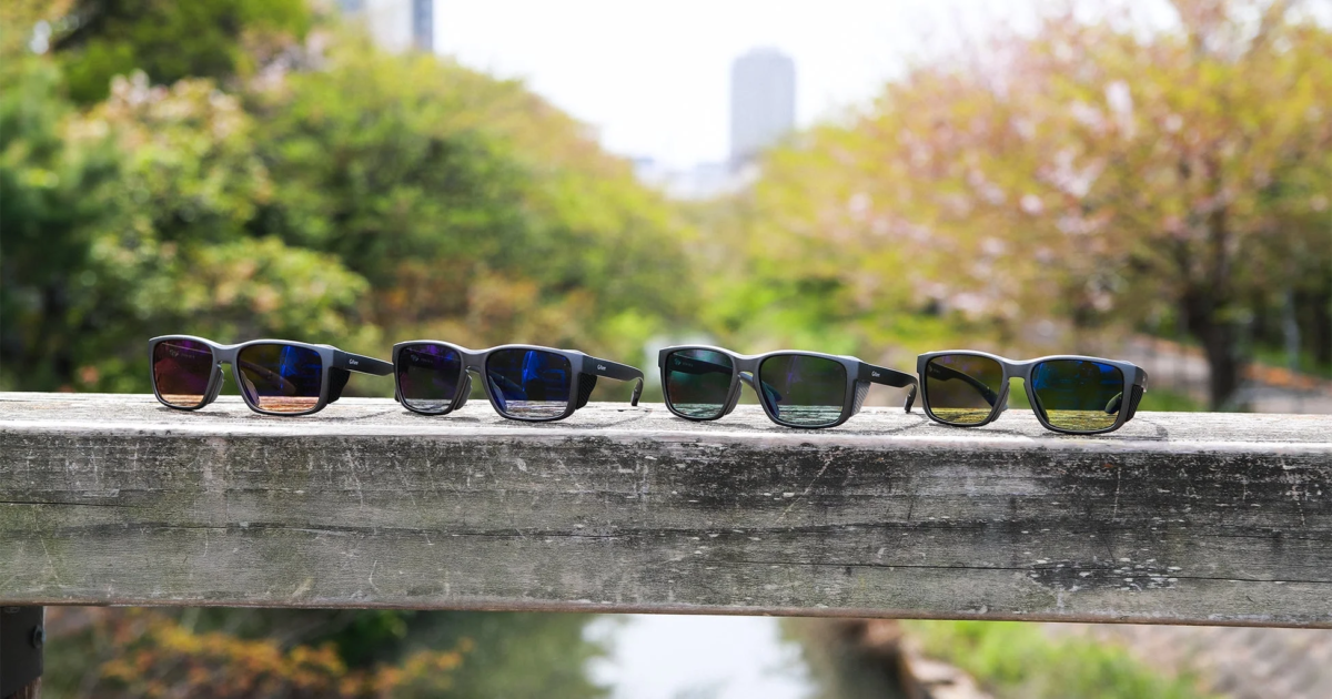 Gillsee Sunglasses on a Wooden Railing