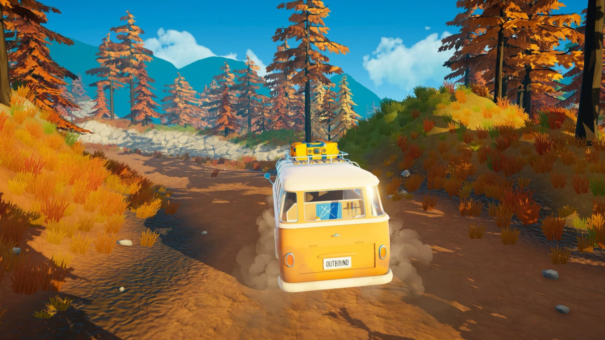 Yellow retro van in autumn landscape