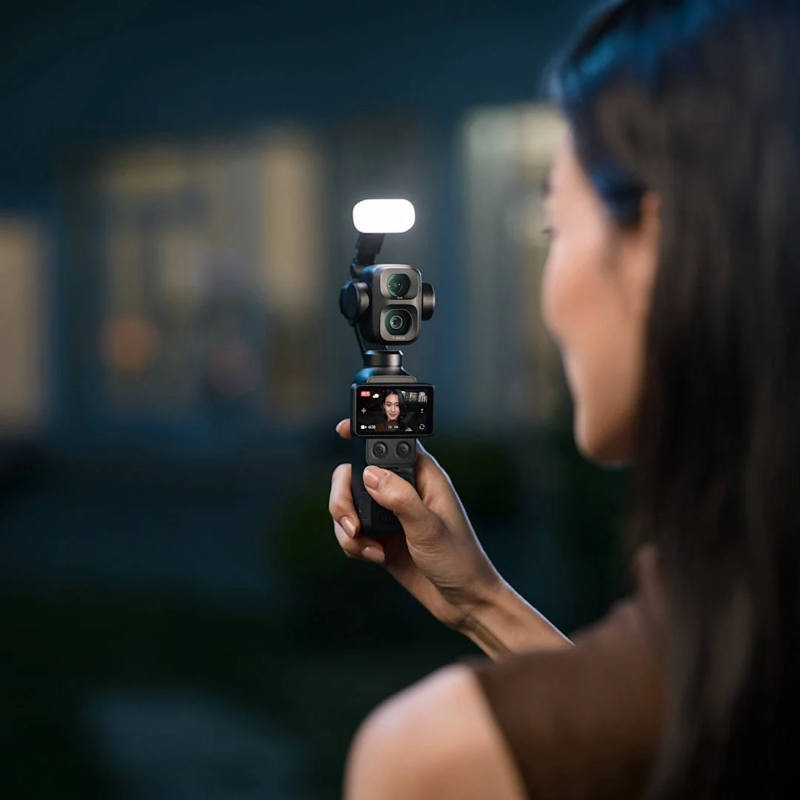 Woman with gimbal camera and light, LIVE 4K F-LOG