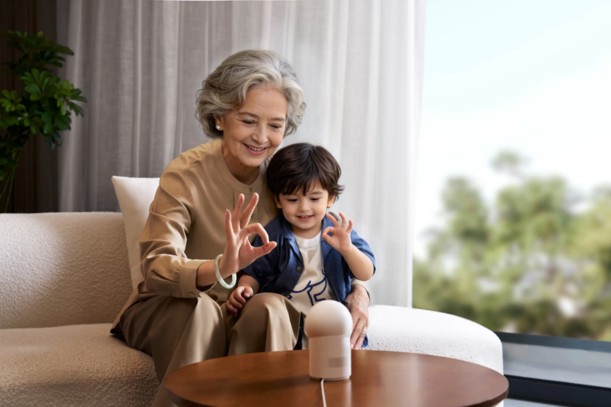 Grandma and child with OK gesture