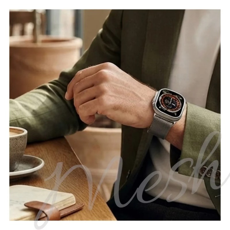 Male wearing Apple Watch in cafe