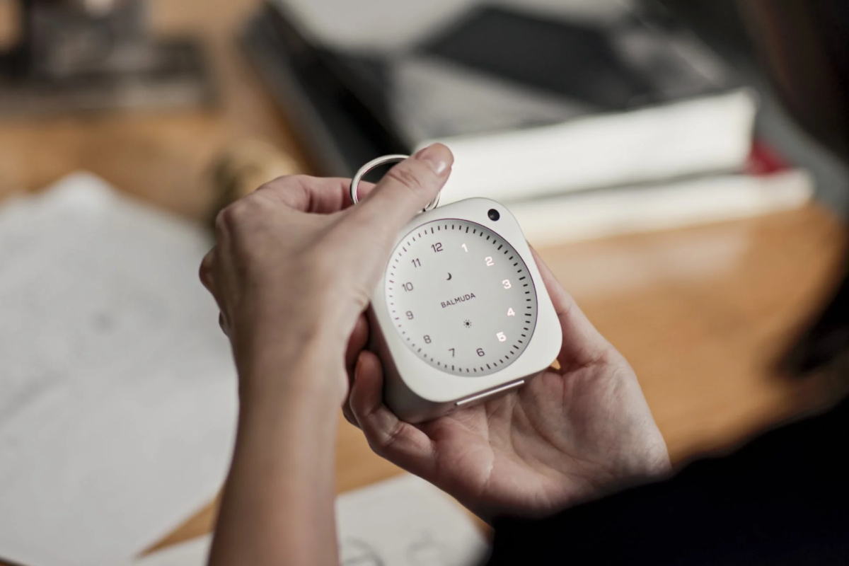 Person holding BALMUDA The Clock