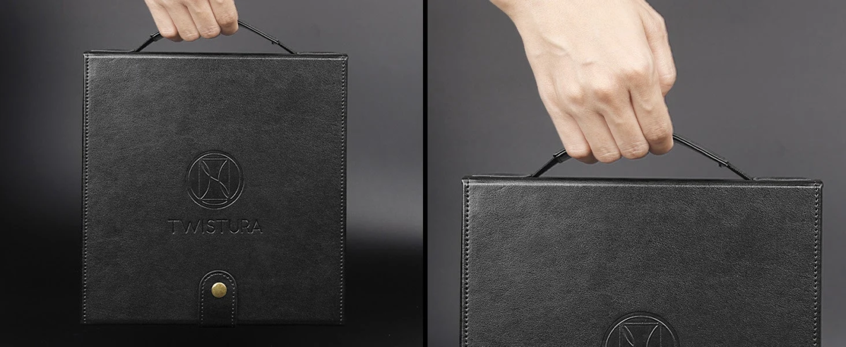 Pandora case with handle, being carried