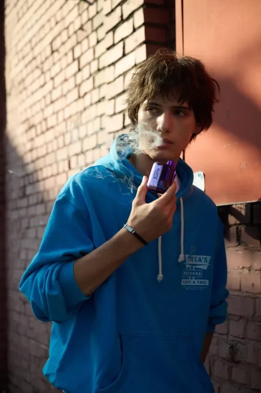 Image of a person vaping