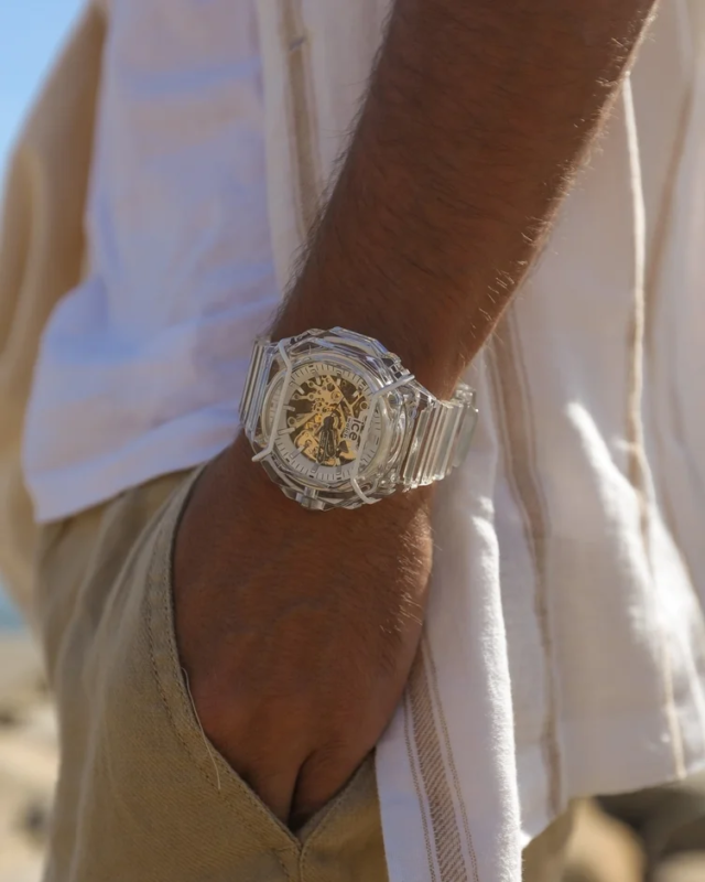 Transparent skeleton watch on a wrist
